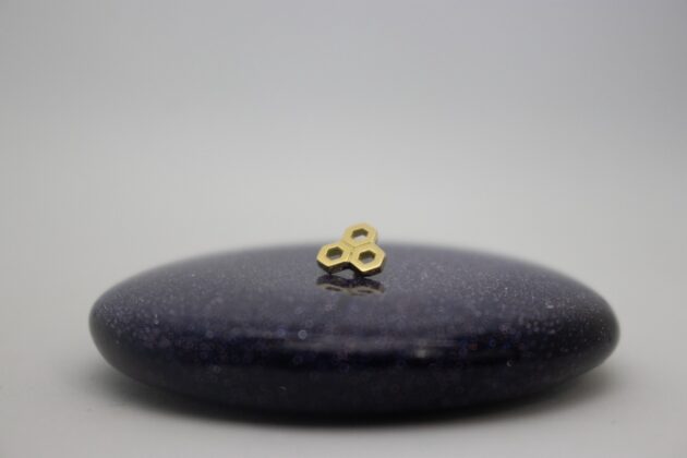 Piercing jewelry by Danila Tarcinale. 3 honeycombs form a triangle. hand made in yellow gold