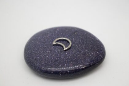 Titanium clicker ring in a cresent moon shape